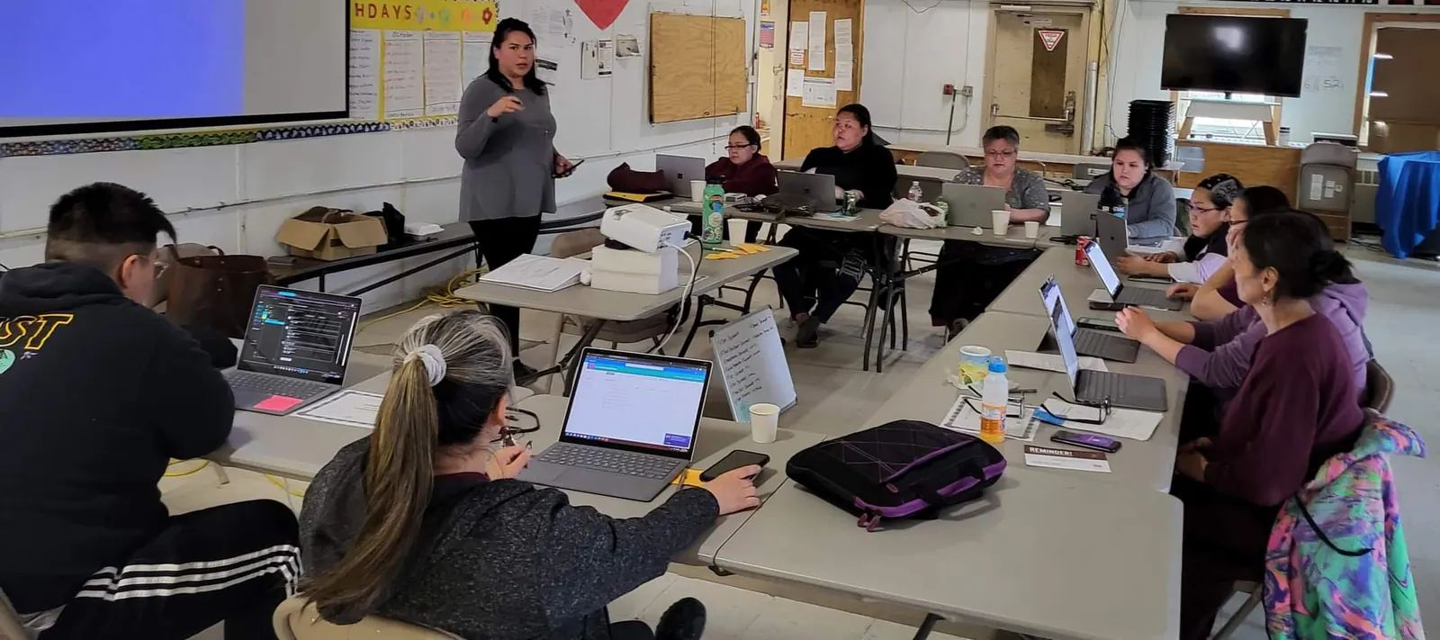 Participants seated in a rural Alaska training room